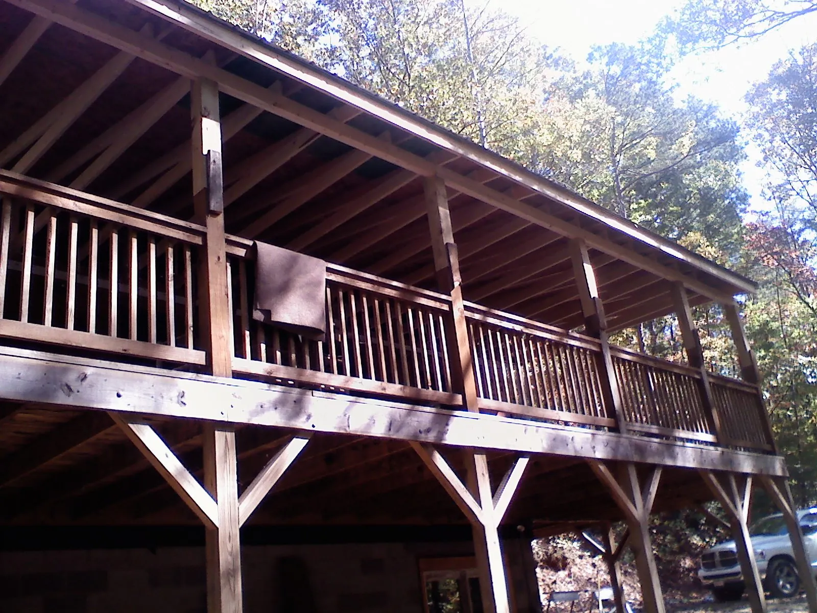 Timber framing under a new elevated porch and deck — Roof Leak Repair in Oakes by Roofing Brothers